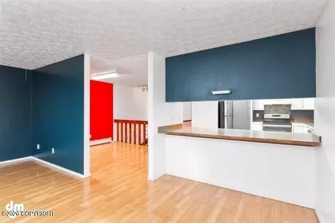 Living - 5132 E 26th Ave, Anchorage, AK 99508 photo 4 of 13