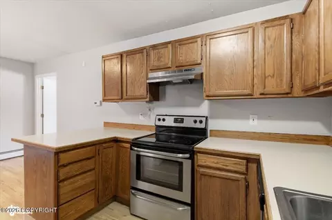 Kitchen - 809 Merlin Loop # A3, Anchorage, AK 99518 photo 3 of 3