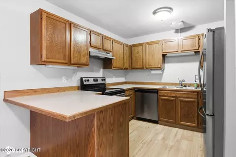 Kitchen - 809 Merlin Loop # A3, Anchorage, AK 99518 photo 1 of 3