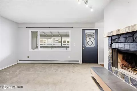 Living - 809 Merlin Loop # A3, Anchorage, AK 99518 photo 1 of 2