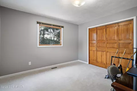 Bedroom - 9502 Dinaaka Cir, Eagle River, AK 99577 photo 7 of 8