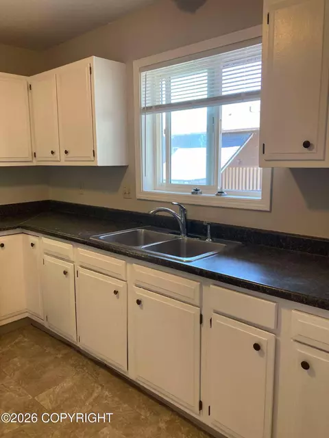 Kitchen - 3911 E 7th Ave, Anchorage, AK 99508 photo 3 of 4
