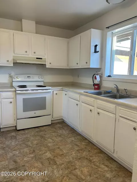 Kitchen - 3911 E 7th Ave, Anchorage, AK 99508 photo 2 of 4