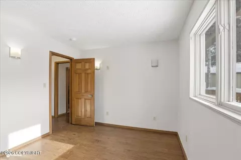 Bedroom - 18146 Harbor Point Loop, Eagle River, AK 99577 photo 6 of 7