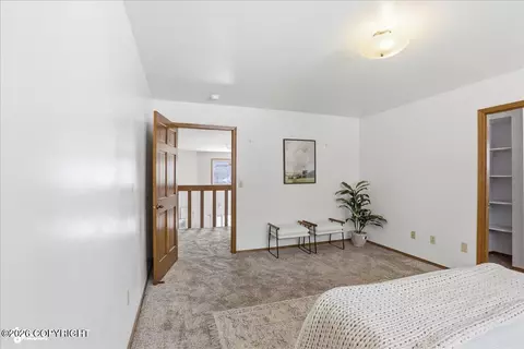 Bedroom - 18146 Harbor Point Loop, Eagle River, AK 99577 photo 2 of 7