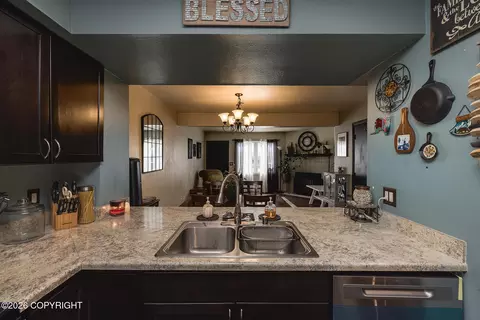 Kitchen - 457 Dailey Ave # E22, Anchorage, AK 99515 photo 1 of 2