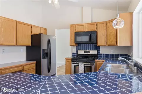 Kitchen - 8190 Kronos Dr, Anchorage, AK 99502 photo 4 of 4