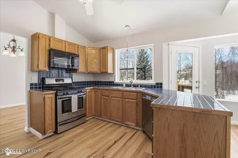 Kitchen - 8190 Kronos Dr, Anchorage, AK 99502 photo 2 of 4