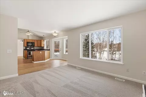 Living - 8190 Kronos Dr, Anchorage, AK 99502 photo 4 of 8