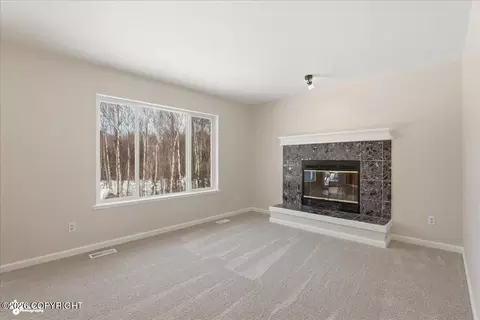 Living - 8190 Kronos Dr, Anchorage, AK 99502 photo 6 of 8