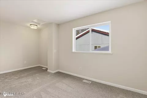 Bedroom - 8190 Kronos Dr, Anchorage, AK 99502 photo 5 of 7
