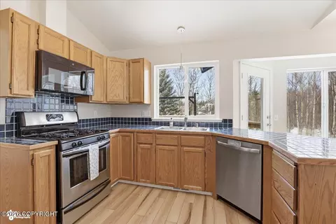 Kitchen - 8190 Kronos Dr, Anchorage, AK 99502 photo 3 of 4
