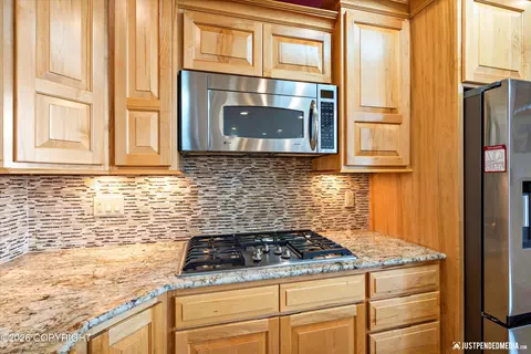 Kitchen - 18455 Mccrary Rd, Eagle River, AK 99577 photo 3 of 7