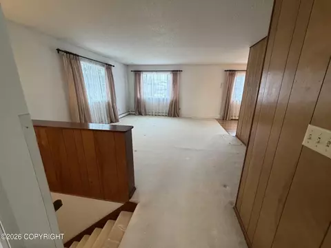 Living - 312 Thomas Cir, Anchorage, AK 99508 photo 1 of 6