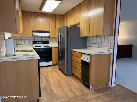 Kitchen - 312 Thomas Cir, Anchorage, AK 99508 photo 2 of 2