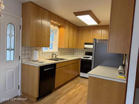 Kitchen - 312 Thomas Cir, Anchorage, AK 99508 photo 1 of 2