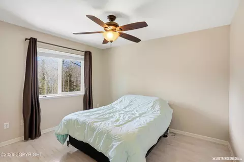 Bedroom - 20844 Trailhead Ave # 6, Eagle River, AK 99577 photo 1 of 5