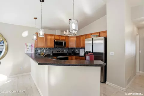 Kitchen - 20844 Trailhead Ave # 6, Eagle River, AK 99577 photo 1 of 4