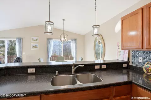 Kitchen - 20844 Trailhead Ave # 6, Eagle River, AK 99577 photo 3 of 4