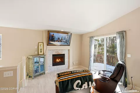 Living - 20844 Trailhead Ave # 6, Eagle River, AK 99577 photo 1 of 2