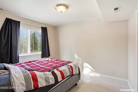 Bedroom - 20844 Trailhead Ave # 6, Eagle River, AK 99577 photo 2 of 5