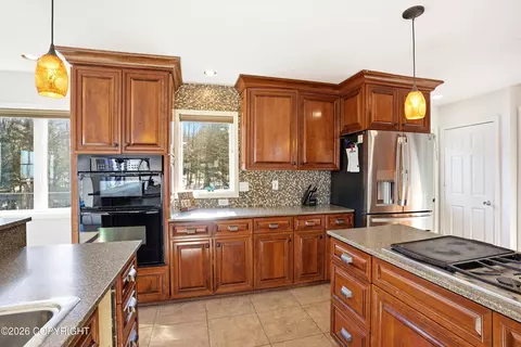 Kitchen - 11601 Hillside Dr, Anchorage, AK 99507 photo 2 of 7