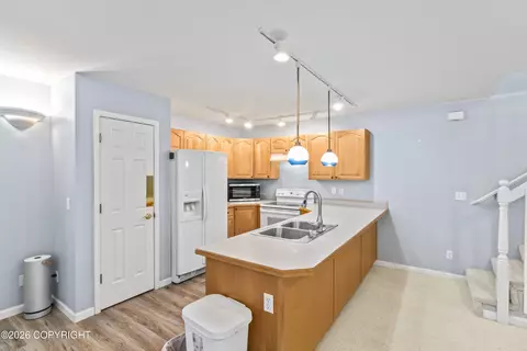 Kitchen - 16633 Rivers Edge Ln # 19, Eagle River, AK 99577 photo 1 of 4