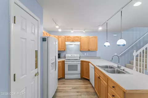 Kitchen - 16633 Rivers Edge Ln # 19, Eagle River, AK 99577 photo 2 of 4