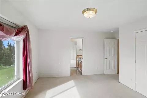 Bedroom - 10121 Middlerock Rd, Anchorage, AK 99507 photo 5 of 9