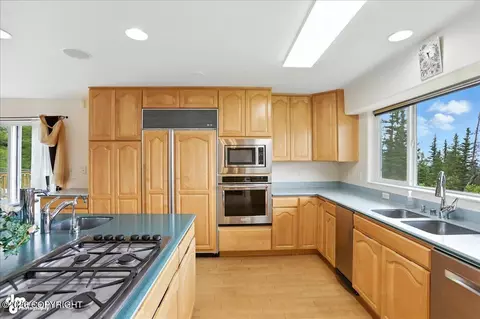 Kitchen - 10121 Middlerock Rd, Anchorage, AK 99507 photo 3 of 4