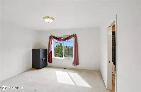 Bedroom - 10121 Middlerock Rd, Anchorage, AK 99507 photo 4 of 9
