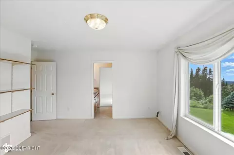 Bedroom - 10121 Middlerock Rd, Anchorage, AK 99507 photo 8 of 9