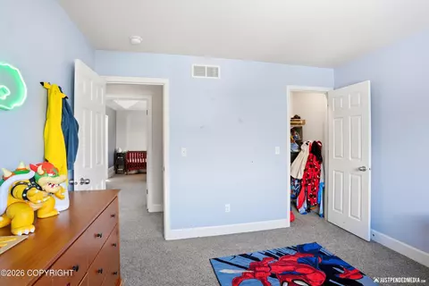 Bedroom - 2695 W River Dr, Eagle River, AK 99577 photo 9 of 10