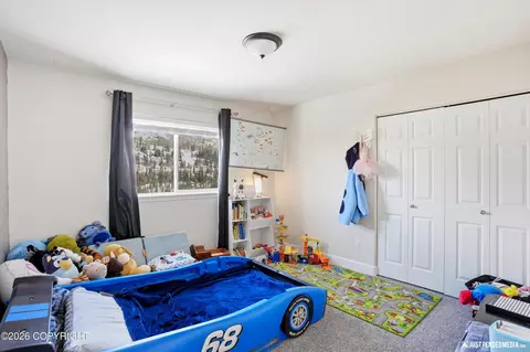 Bedroom - 2695 W River Dr, Eagle River, AK 99577 photo 7 of 10