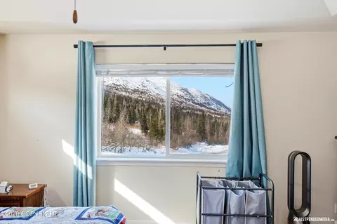 Bedroom - 2695 W River Dr, Eagle River, AK 99577 photo 6 of 10