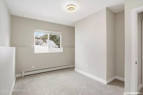 Bedroom - 6700 Round Tree Dr, Anchorage, AK 99507 photo 6 of 7