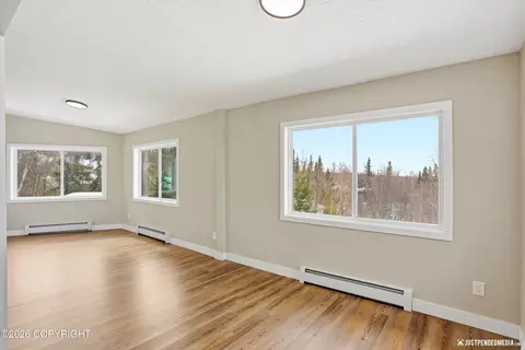 Living - 6700 Round Tree Dr, Anchorage, AK 99507 photo 3 of 7