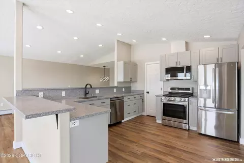 Kitchen - 6700 Round Tree Dr, Anchorage, AK 99507 photo 2 of 6