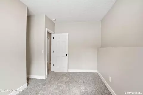 Bedroom - 6700 Round Tree Dr, Anchorage, AK 99507 photo 7 of 7