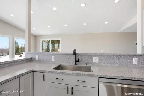 Kitchen - 6700 Round Tree Dr, Anchorage, AK 99507 photo 5 of 6