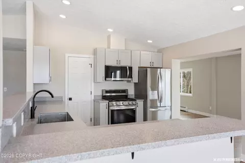 Kitchen - 6700 Round Tree Dr, Anchorage, AK 99507 photo 3 of 6
