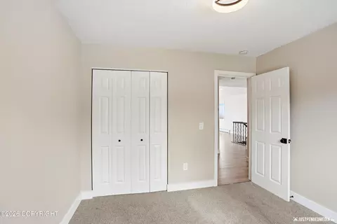 Bedroom - 6700 Round Tree Dr, Anchorage, AK 99507 photo 3 of 7