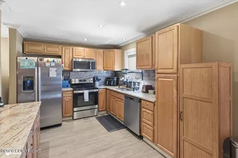 Kitchen - 7803 Raymar Cir, Anchorage, AK 99518 photo 3 of 4