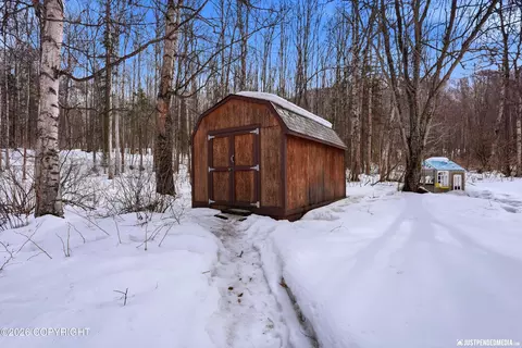 Exterior - 24407 Thunderbird Dr, Chugiak, AK 99567 photo 8 of 10