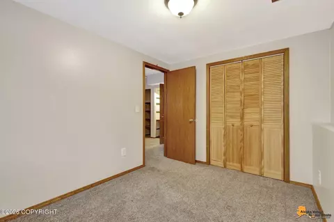 Bedroom - 7471 Clairborne Cir, Anchorage, AK 99502 photo 6 of 6