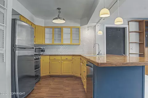 Kitchen - 2395 E 47th Ct, Anchorage, AK 99507 photo 2 of 4