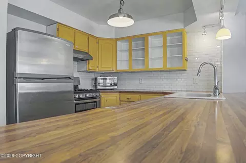 Kitchen - 2395 E 47th Ct, Anchorage, AK 99507 photo 3 of 4