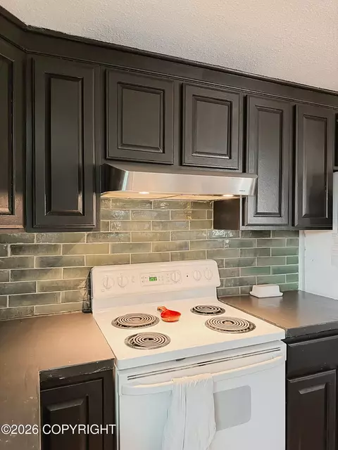 Kitchen - 201 E 5th Ave, North Pole, AK 99705 photo 2 of 2