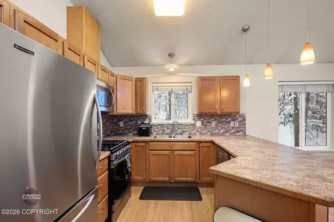 Kitchen - 11803 Galloway Loop # 51, Eagle River, AK 99577 photo 3 of 4