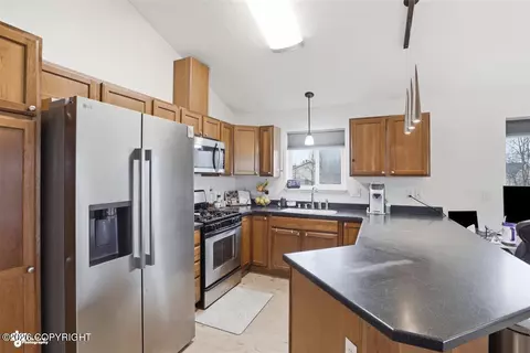 Kitchen - 11801 Falklands Dr # 75, Eagle River, AK 99577 photo 1 of 4